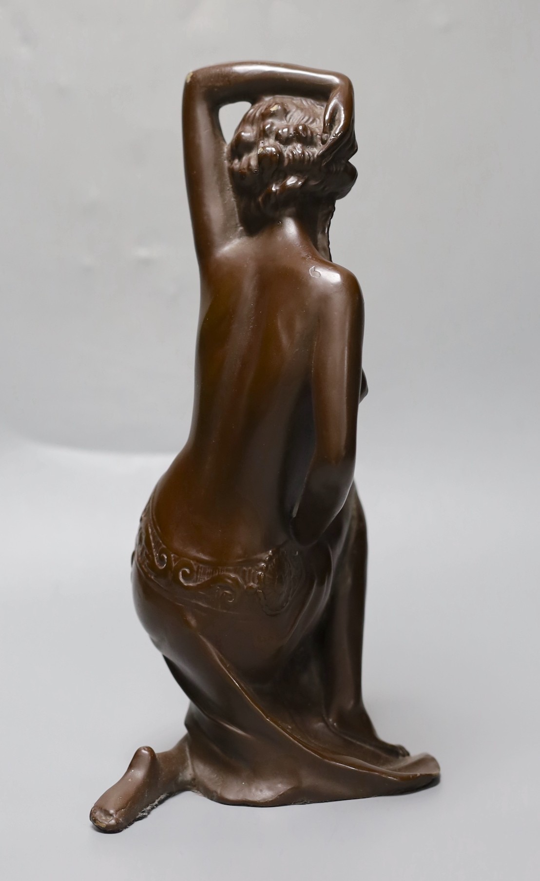 A brown lacquered bronze figure of a lady 30cm